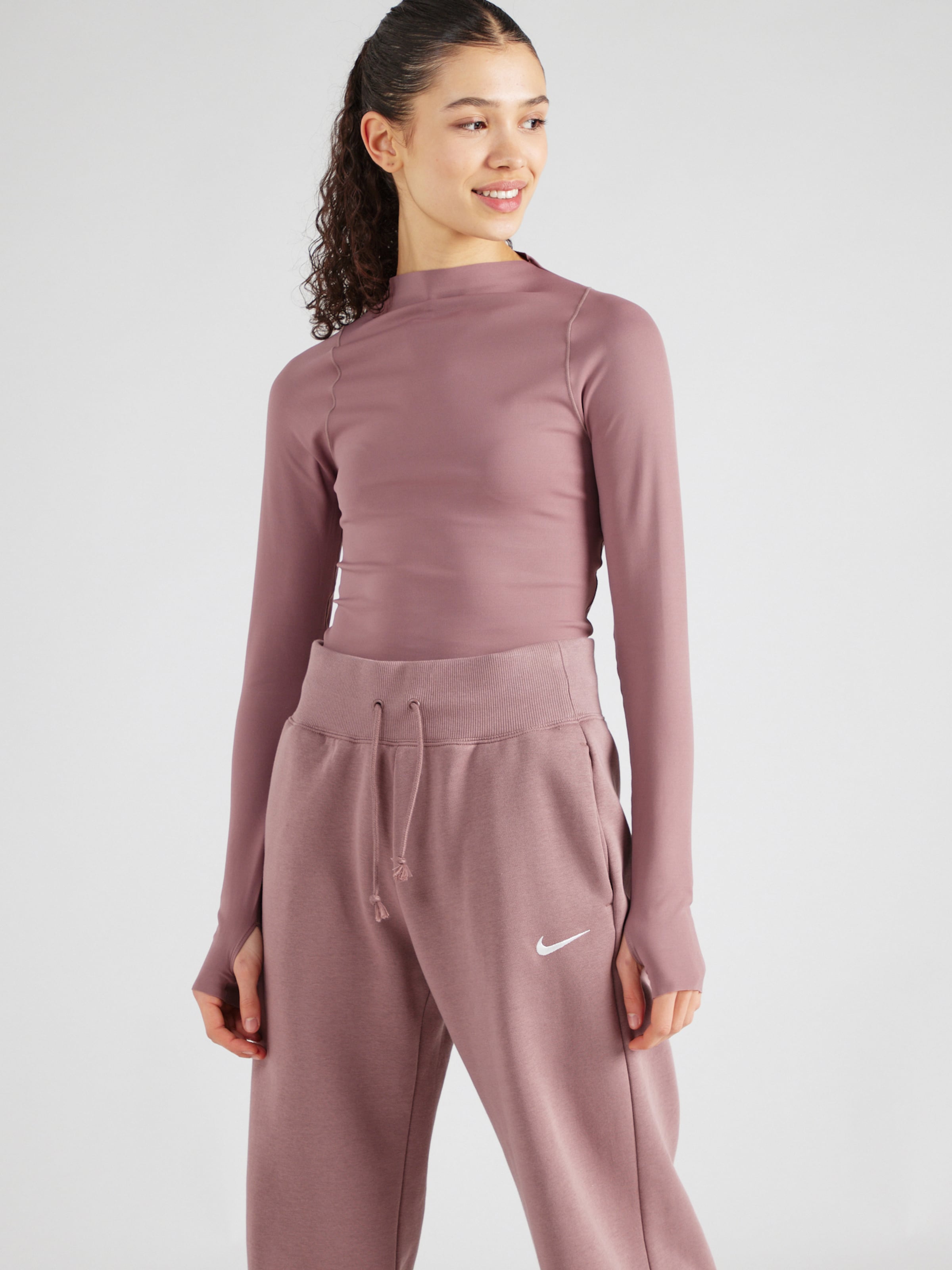 T shirt fonctionnel NIKE en Mauve ABOUT YOU