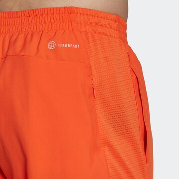 ADIDAS SPORTSWEAR Regular Workout Pants 'Own the Run' in Orange
