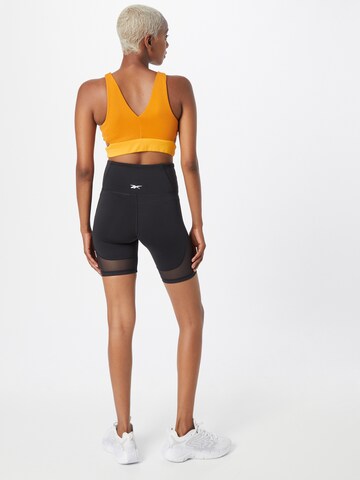 Reebok Skinny Sportbroek 'Les Mills' in Zwart