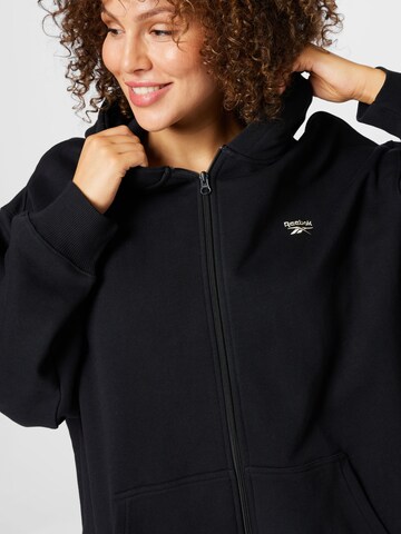 Reebok - Sudadera con cremallera en negro