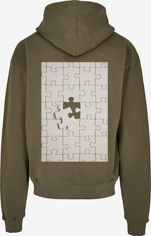 Merchcode Sweatshirt 'Missing Piece' in Groen