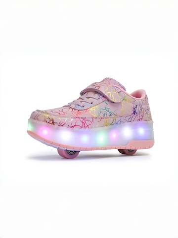 HUSKSWARE Inline and Roller Skates in Pink: front