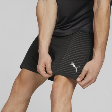 PUMA Regular Sportshorts in Schwarz