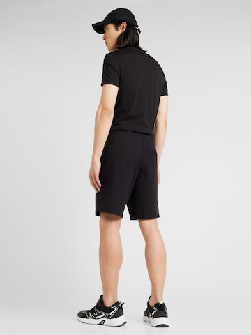 Calvin Klein Jeans Loosefit Kalhoty 'INSTITUTIONAL' – černá