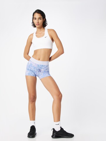 NIKE - Skinny Pantalón deportivo en lila