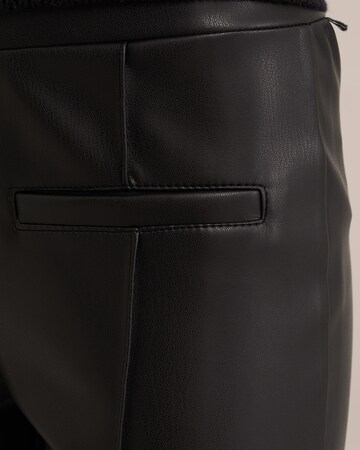 WE Fashion - Acampanado Leggings en negro