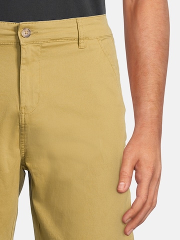 AÉROPOSTALE - Regular Calças chino em amarelo