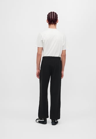 PUMA Loose fit Trousers 'Essential' in Black