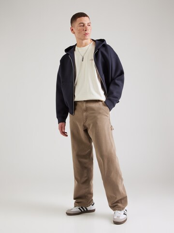 Maglietta di GUESS JEANS in beige