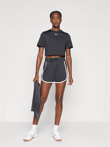 T-shirt fonctionnel 'MICHAELA' Reebok en noir