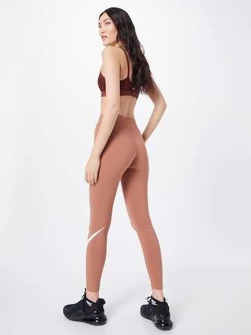 Skinny Leggings 'Essential' di NIKE in marrone