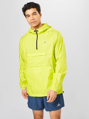 Veste de sport ADIDAS SPORTSWEAR en jaune : devant