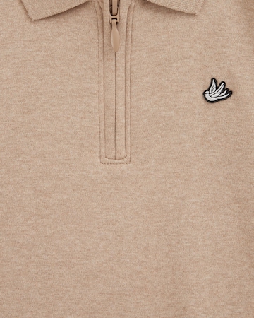 Tricou de la WE Fashion pe bej