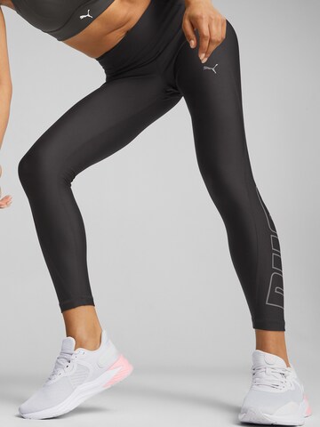 PUMA Skinny Workout Pants in Black: front