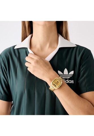 ADIDAS ORIGINALS Analogt ur 'Retro Wave Three' i guld: forside