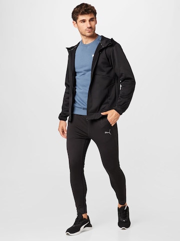 PUMA Sportsweatjacke 'TRAIN ALL DAY' in Schwarz