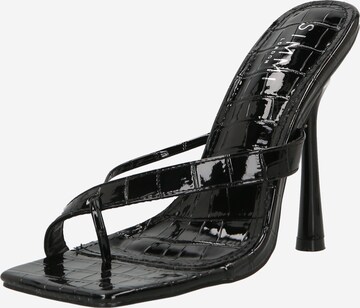 Simmi London - Sandalias de dedo 'PETRA' en negro: frente