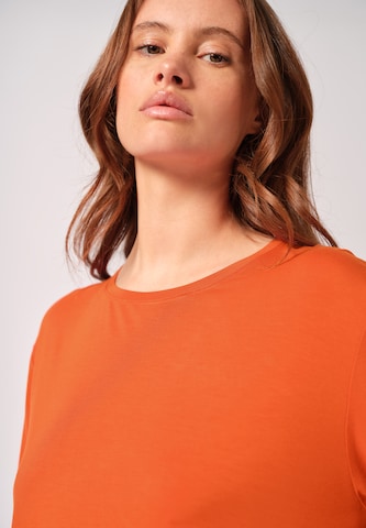 T-shirt Skiny en orange