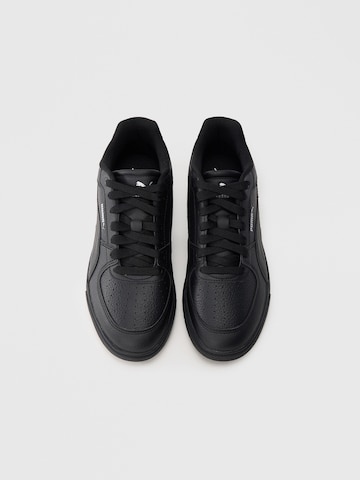 PUMA Sneaker 'Caven III' in Schwarz