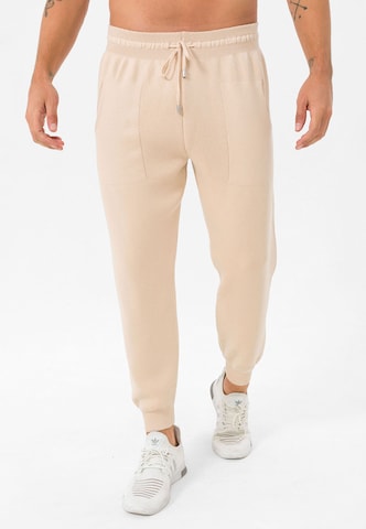 Jimmy Sanders Tapered Trousers in Beige: front
