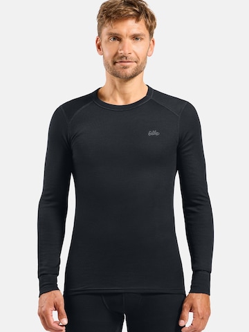 Base layer 'ACTIVE WARM UNI HERITAGE' di ODLO in nero