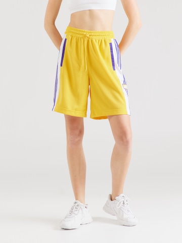 ADIDAS ORIGINALS Loose fit Workout Pants in Yellow: front