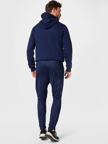 Reebok Tapered Sportbroek in Blauw