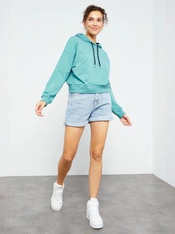 Felpa di Tommy Life in verde