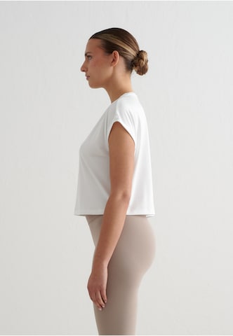 Maglia funzionale di Aim'n in bianco