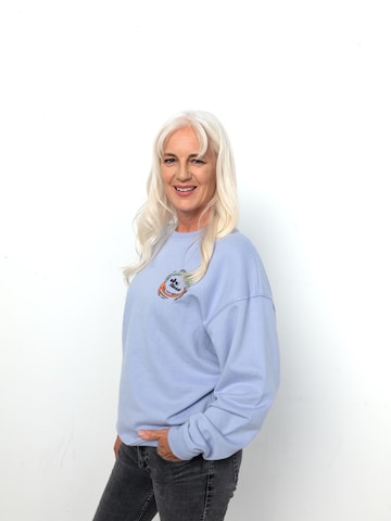 Sweat-shirt 'MAYRHOFEN 89' elho en violet : devant