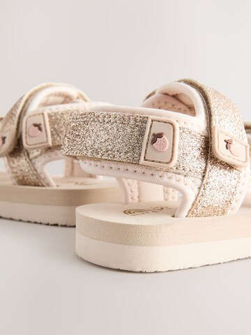 Next - Sandalias en oro