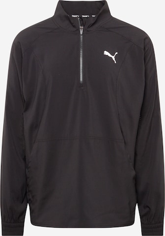 PUMA - Camiseta deportiva en negro: frente