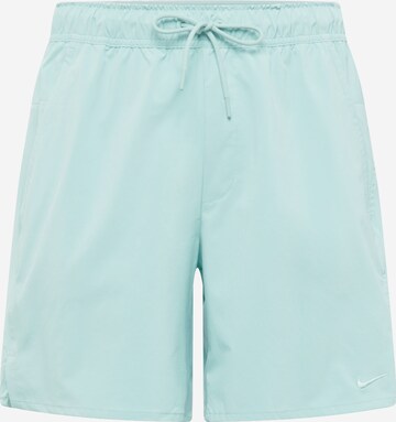 NIKE Workout Pants in Blue: front