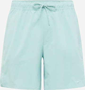 NIKE Regular Sports trousers in Blue: front