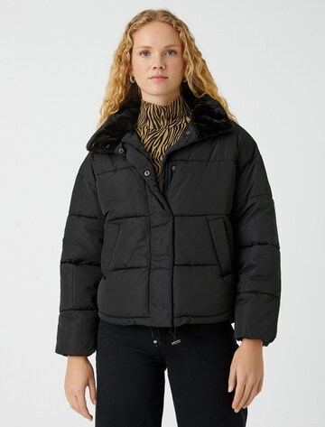 Koton Winter Jacket in Black: front