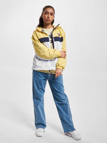 Tommy Jeans Přechodná bunda 'Chicago' – žlutá