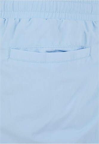 Effilé Pantalon Karl Kani en bleu