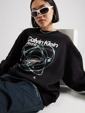 Calvin Klein JeansSweater majica 'GALAXY' - crna boja