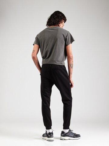 Tapered Pantaloni 'ONSLiam' di Only & Sons in nero