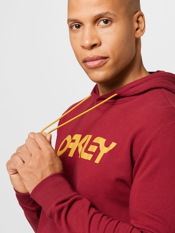 OAKLEY - Sweatshirt de desporto em vermelho