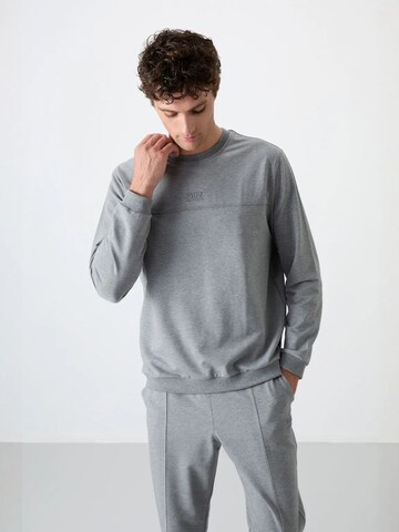 Tuta da jogging di Tommy Life in grigio