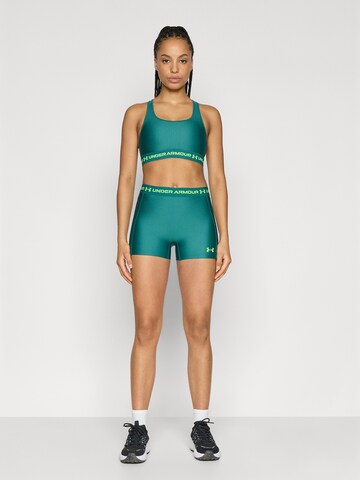 UNDER ARMOUR Bustier Biustonosz sportowy w kolorze zielony