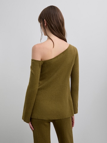 Pull-over ' ' Scalpers en vert