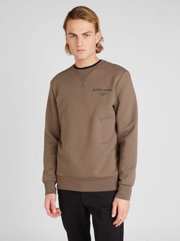 BJÖRN BORG Sport sweatshirt 'ESSENTIAL' i brun: framsida