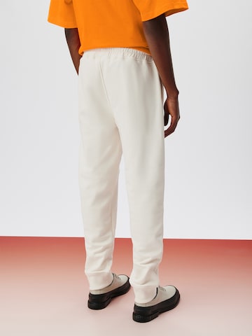 ABOUT YOU x Kingsley Coman Tapered Trousers 'Lio' in White