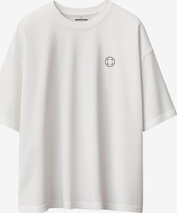 UNORGANIZED BRAND - Camiseta 'SCHWERES OVERSIZE T5' en blanco: frente