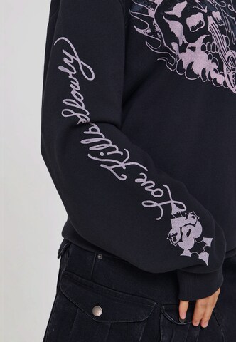juoda Ed Hardy Megztinis: šonas