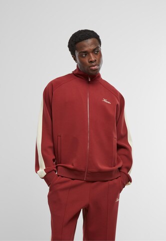 Veste de survêtement Karl Kani en rouge : devant