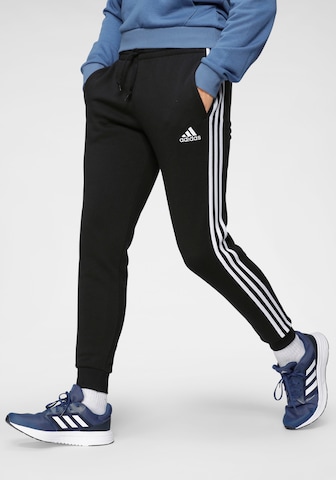 ADIDAS SPORTSWEAR Tapered Workout Pants in Black: front