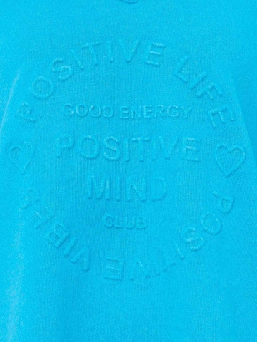Zwillingsherz Sweatshirt 'Positive Mind' i blå